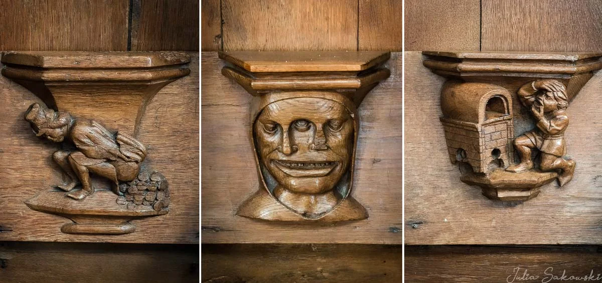 Misericords carved beneath folding wooden seats